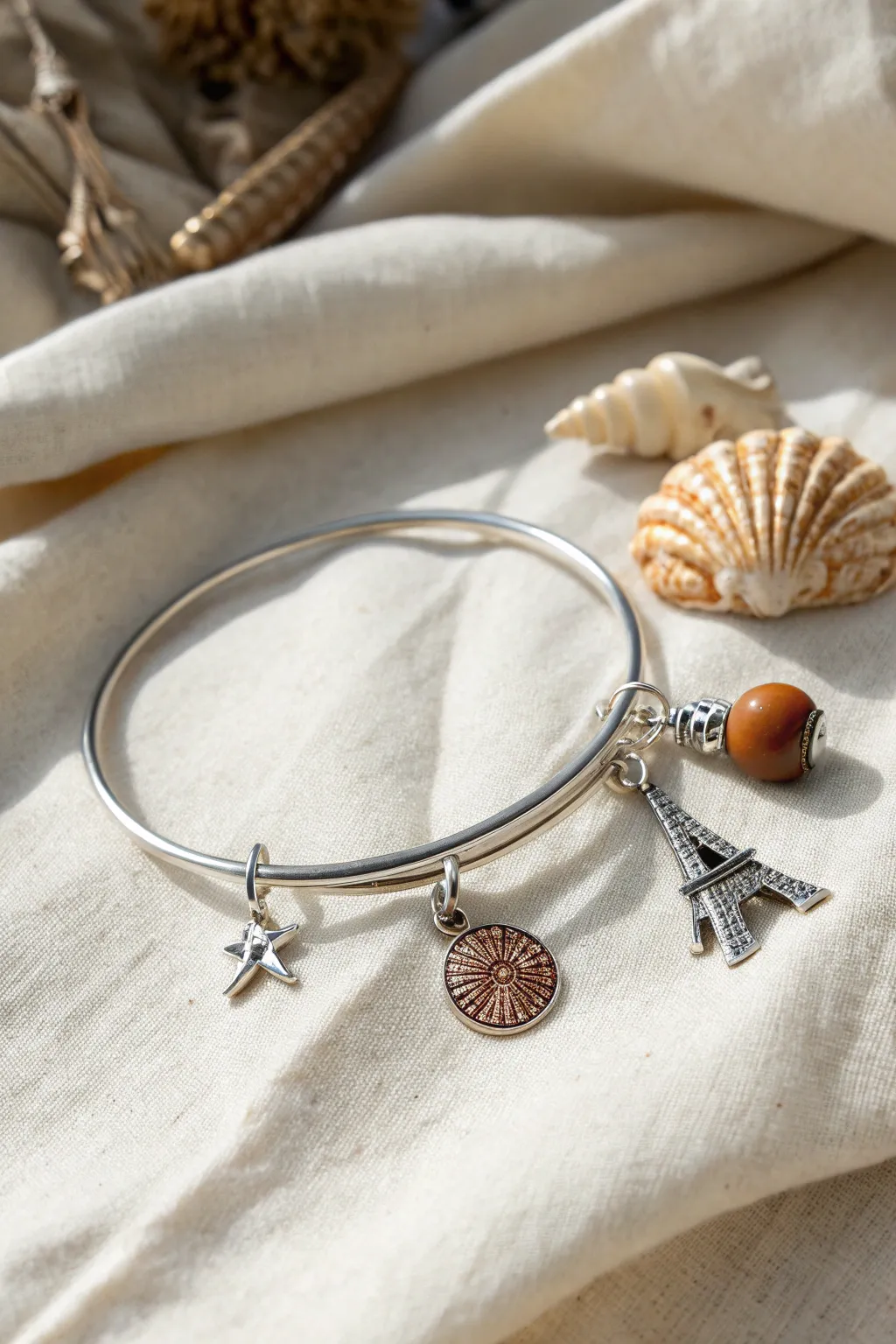 Wear your adventures with a minimalist charm bangle that tells your unique story.