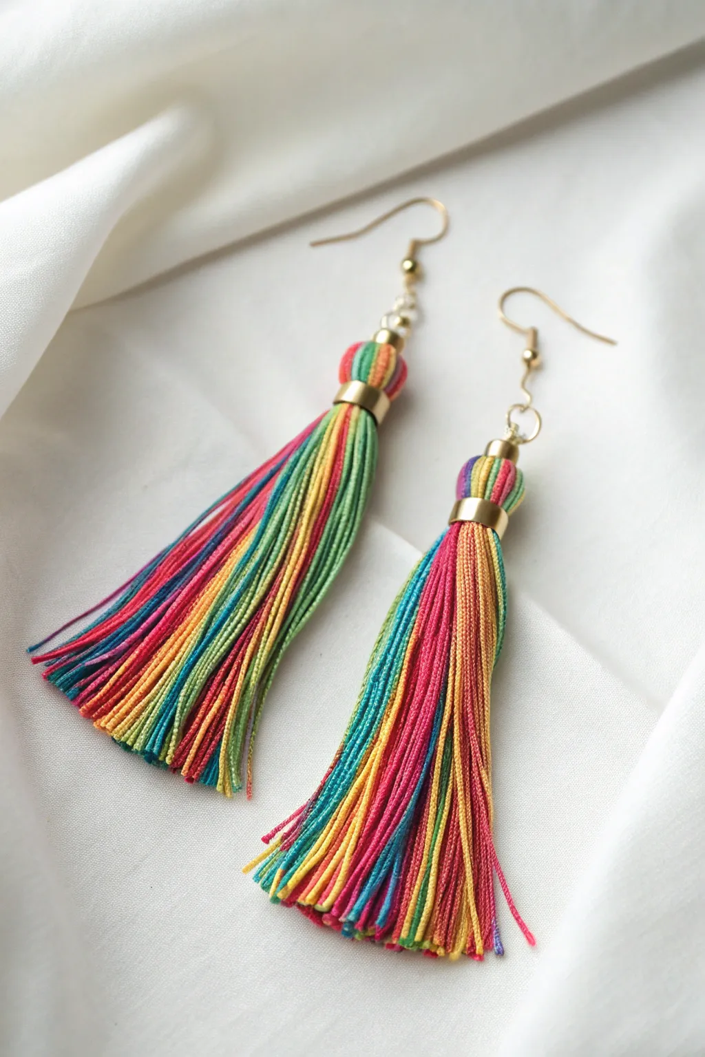 Add a splash of color to your style with these handcrafted fabric tassel earrings. Perfect for those who appreciate simplicity and natural beauty.