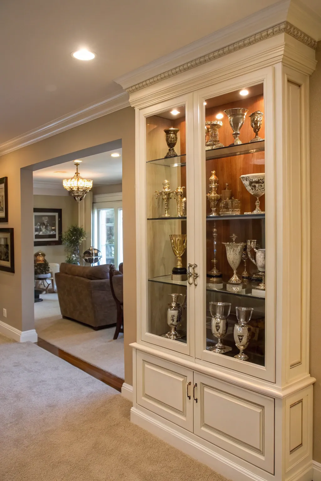 A custom-built cabinet displaying a collection of trophies.
