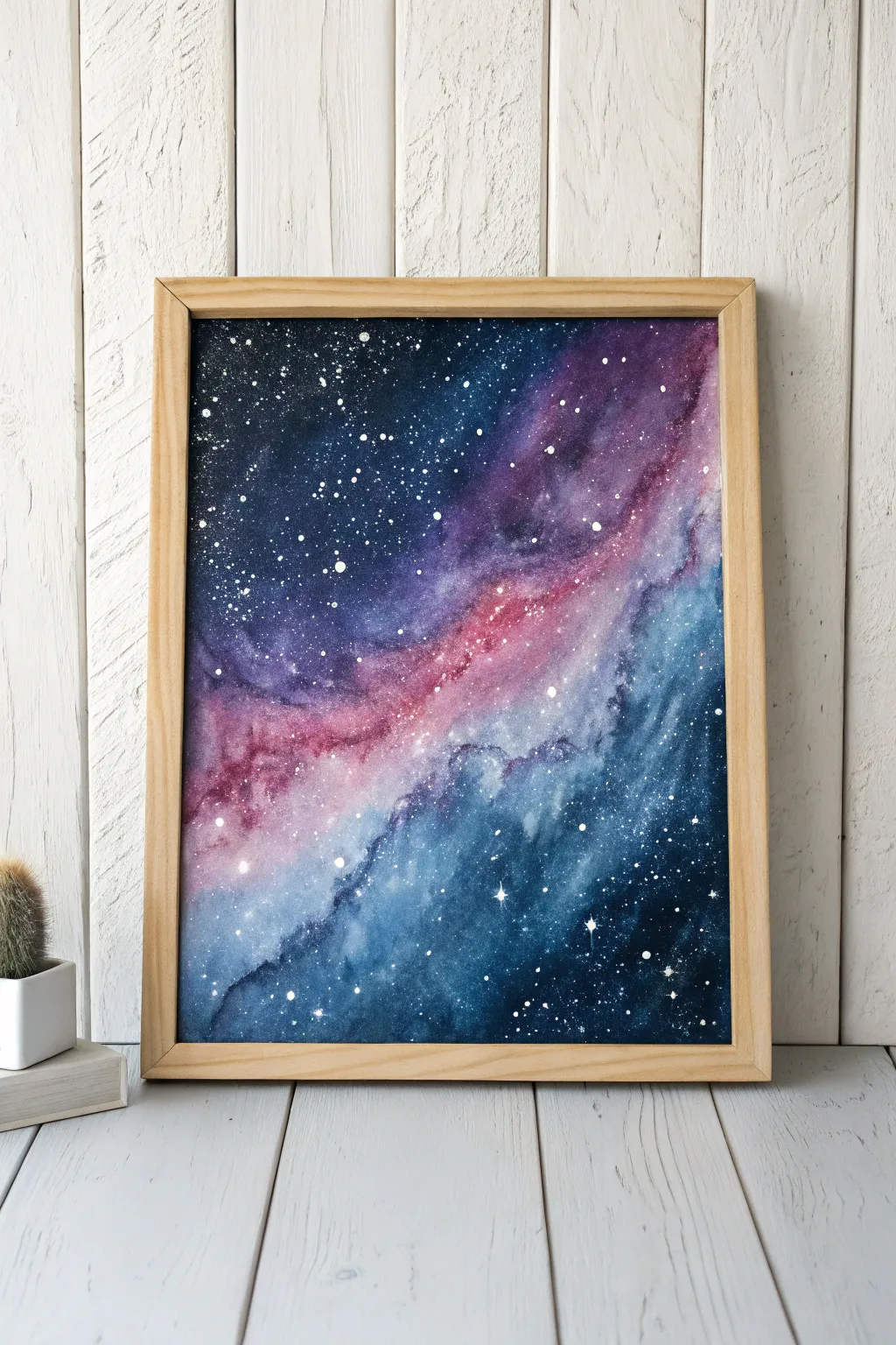 Dive into the cosmos with this enchanting watercolor galaxy painting. Perfect for adding a touch of celestial magic to your home.