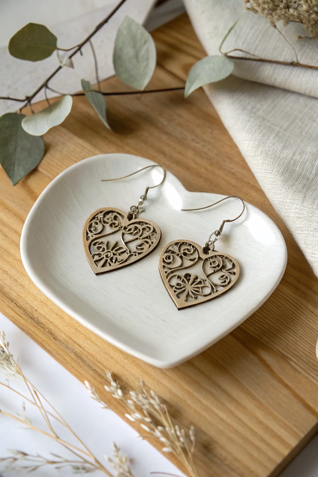 Delicate elegance: These laser-cut heart earrings are the perfect blend of minimalist beauty and bohemian charm.