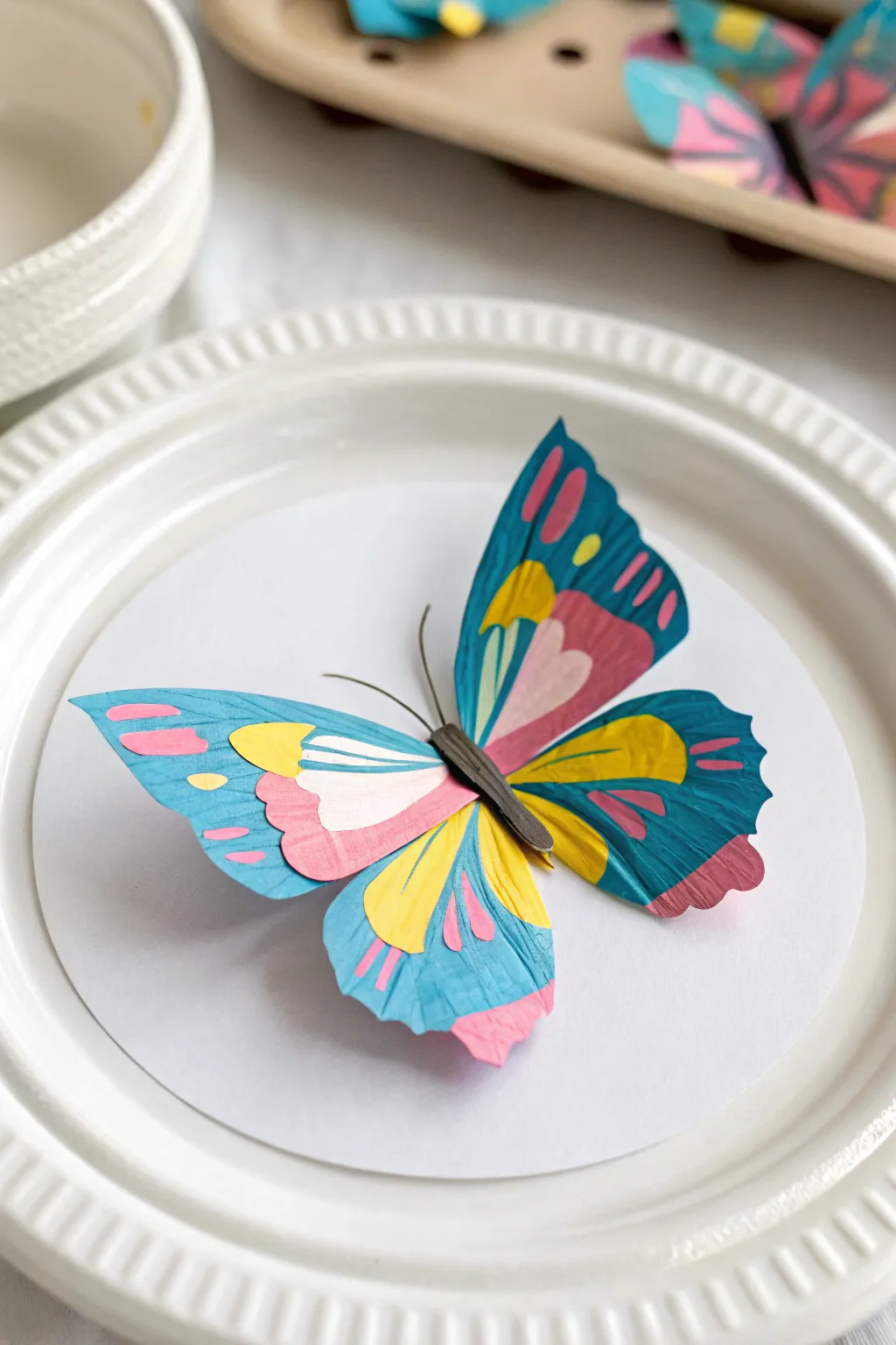 Transform paper into enchanting insect art with simplicity and flair.