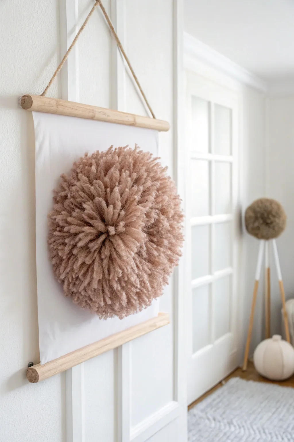 Elevate your space with minimalist pom pom wall art—where craftsmanship meets natural beauty.