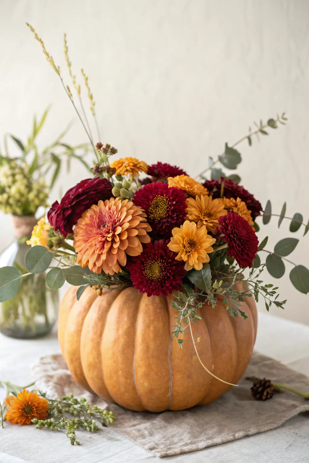 Embrace autumn's charm with a pumpkin flower vase—nature's perfect centerpiece for your fall decor.