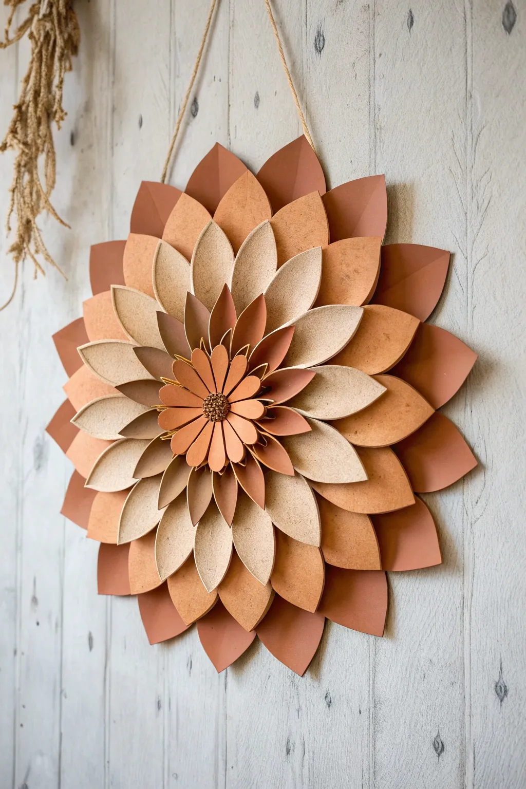 Bring a touch of eternal spring into your home with this stunning cardboard flower collage.