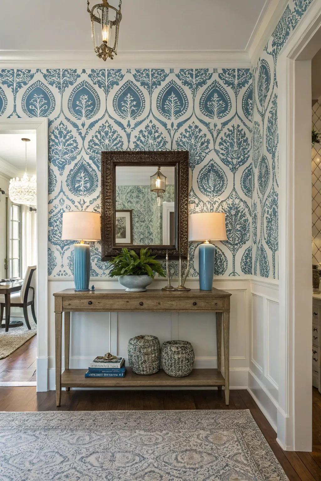 A welcoming entryway with stylish blue wallpaper.