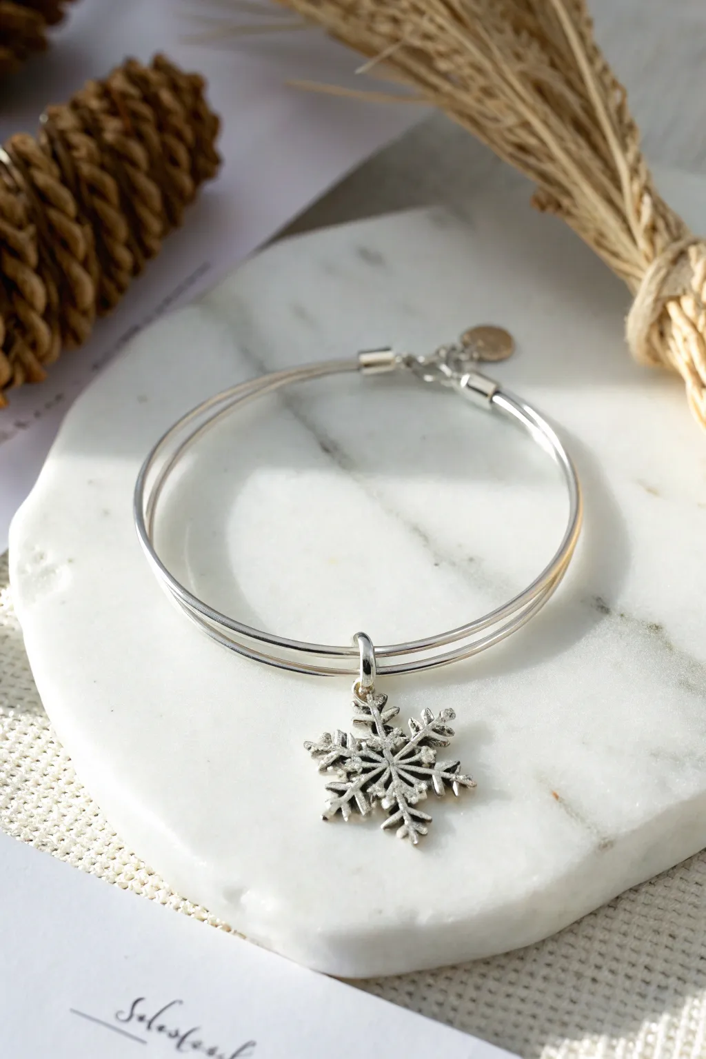 Embrace winter's magic with our Snowflake Elegance bracelet, where simplicity meets timeless beauty.