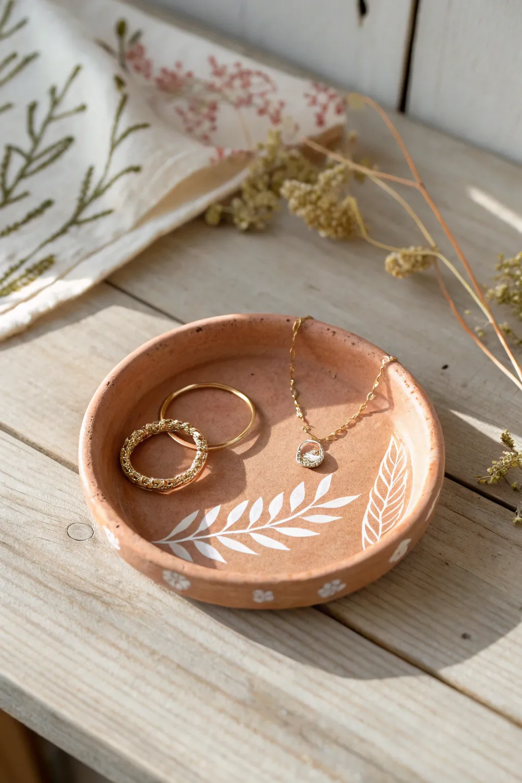 Elegance in Simplicity: Discover the charm of handcrafted clay plates for your cherished trinkets.
