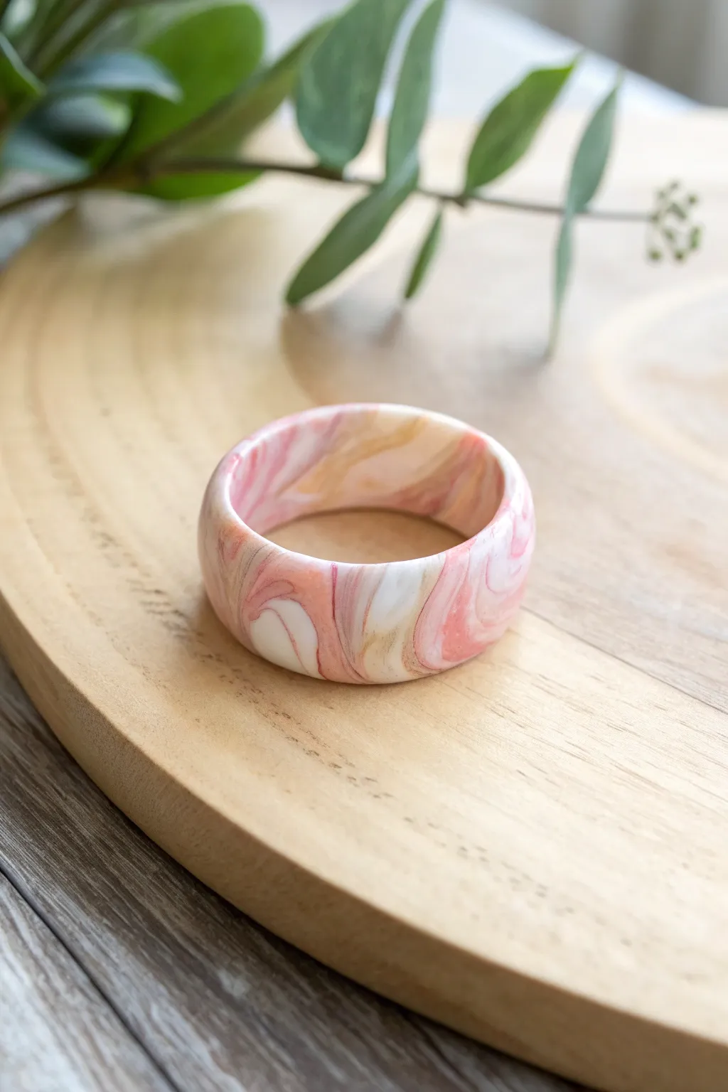Embrace the beauty of handmade elegance with this marbled clay ring, perfect for adding a touch of minimalist charm to any outfit.