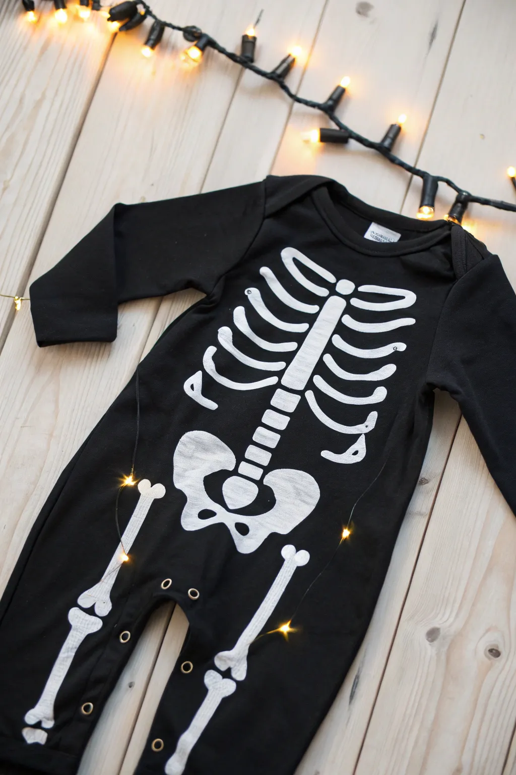 Craft your own spooky elegance with this minimalist DIY skeleton costume for toddlers!