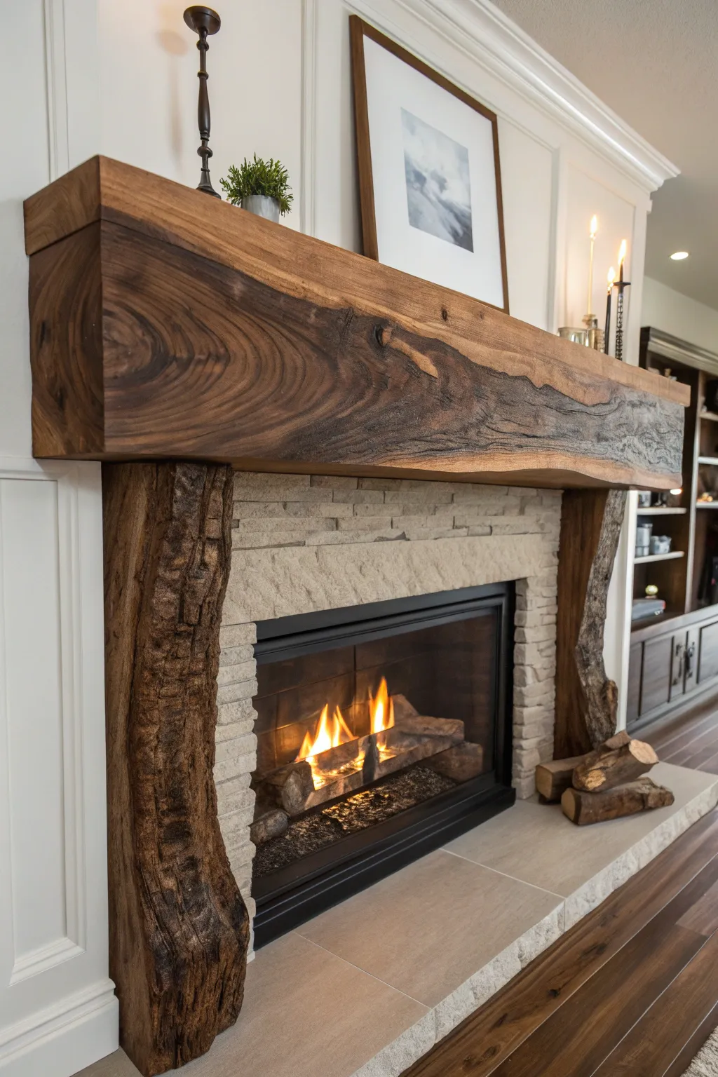 Warm up your living space with this stunning wood slab mantel, a testament to timeless craftsmanship.