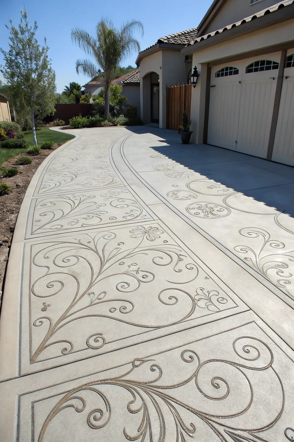 An engraved driveway with intricate patterns.