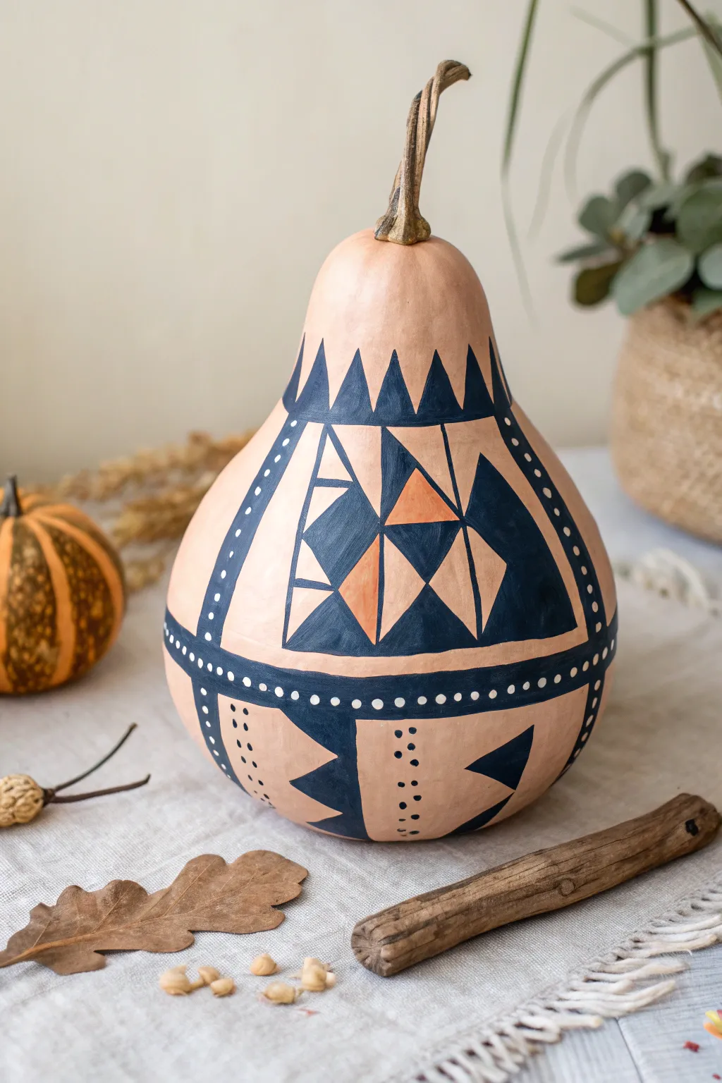 Transform your space with bold geometric designs on gourds, where contemporary flair meets natural elegance.