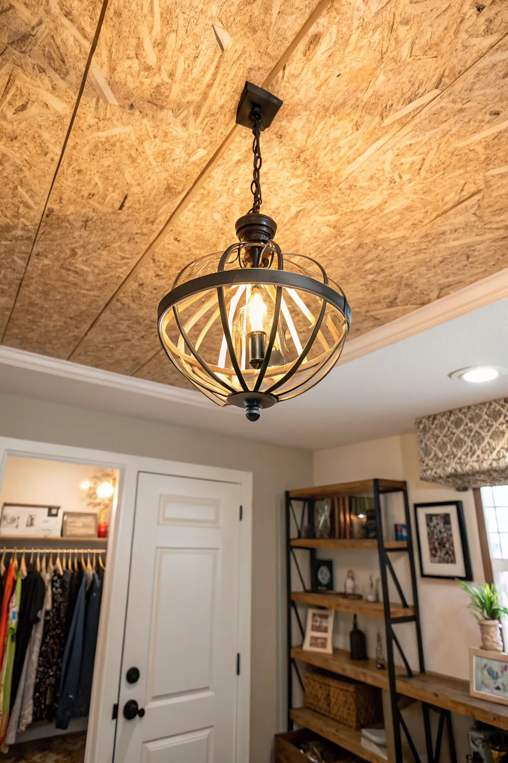 Illuminate your space with creativity: A stunning light fixture transforms an OSB ceiling into a work of art.