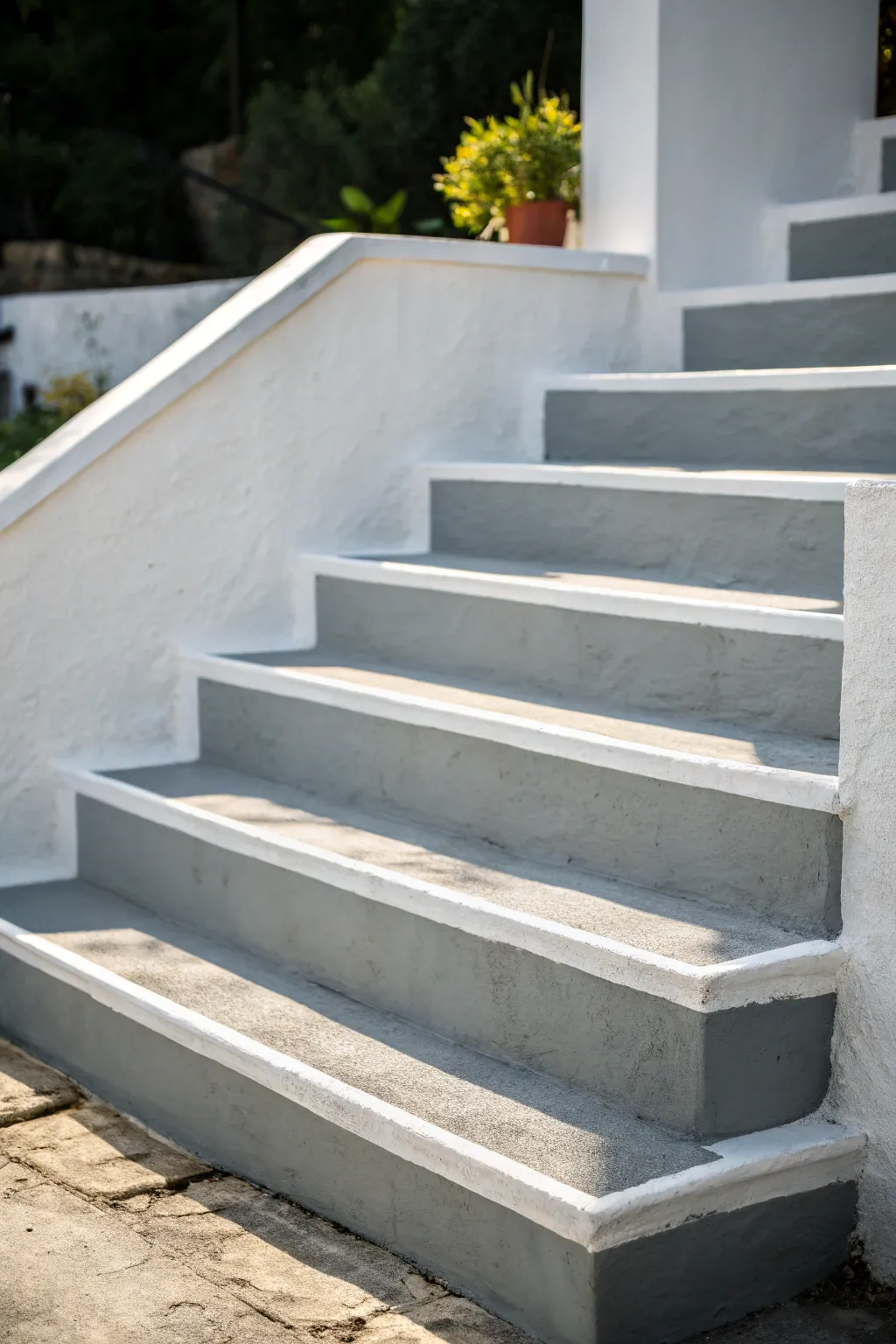 Elevate your home with monochromatic elegance: explore the art of painted concrete steps.