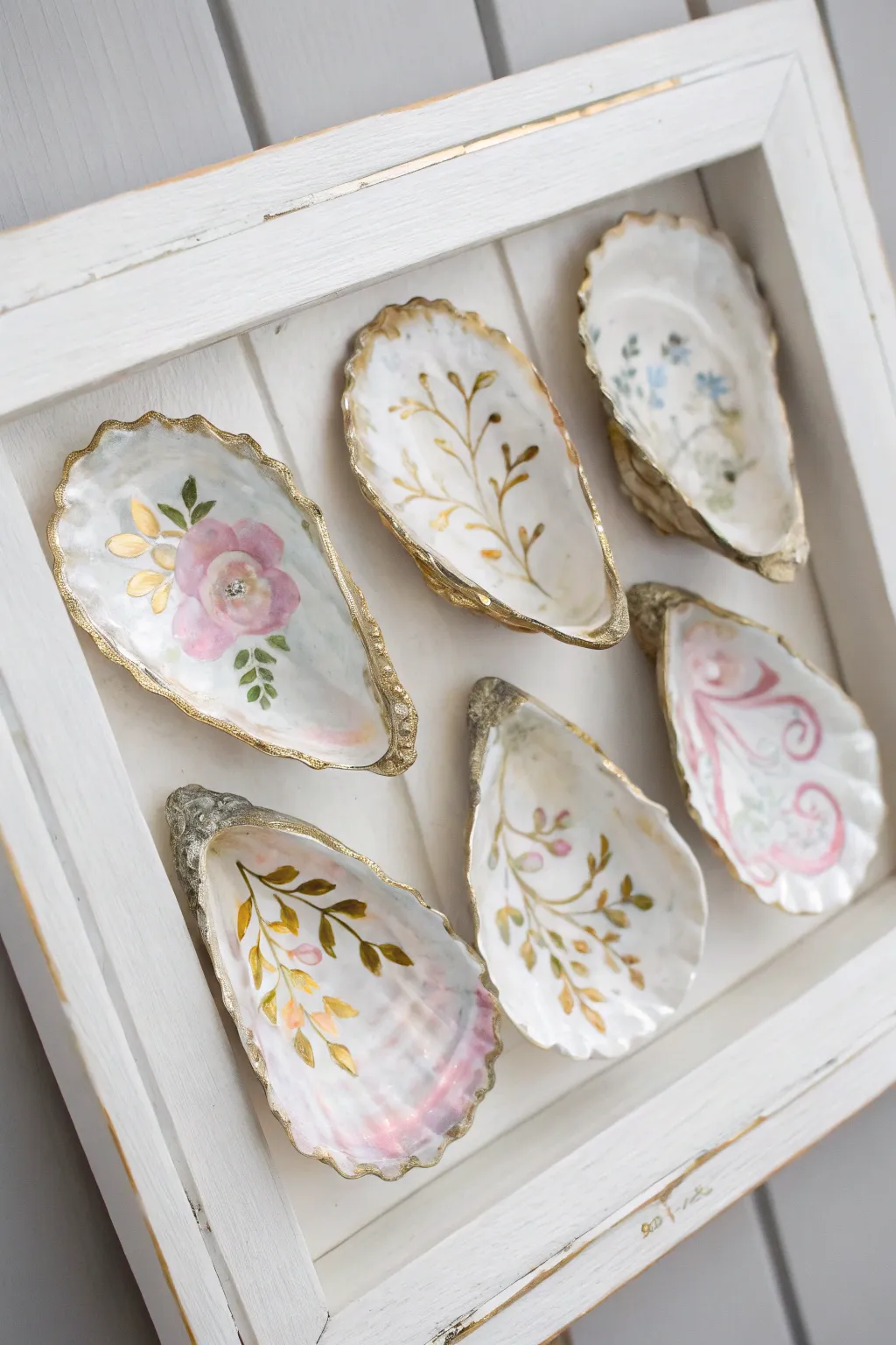 Transform your space with this elegant framed oyster shell art, a blend of simplicity and boho elegance perfect for any minimalist decor.
