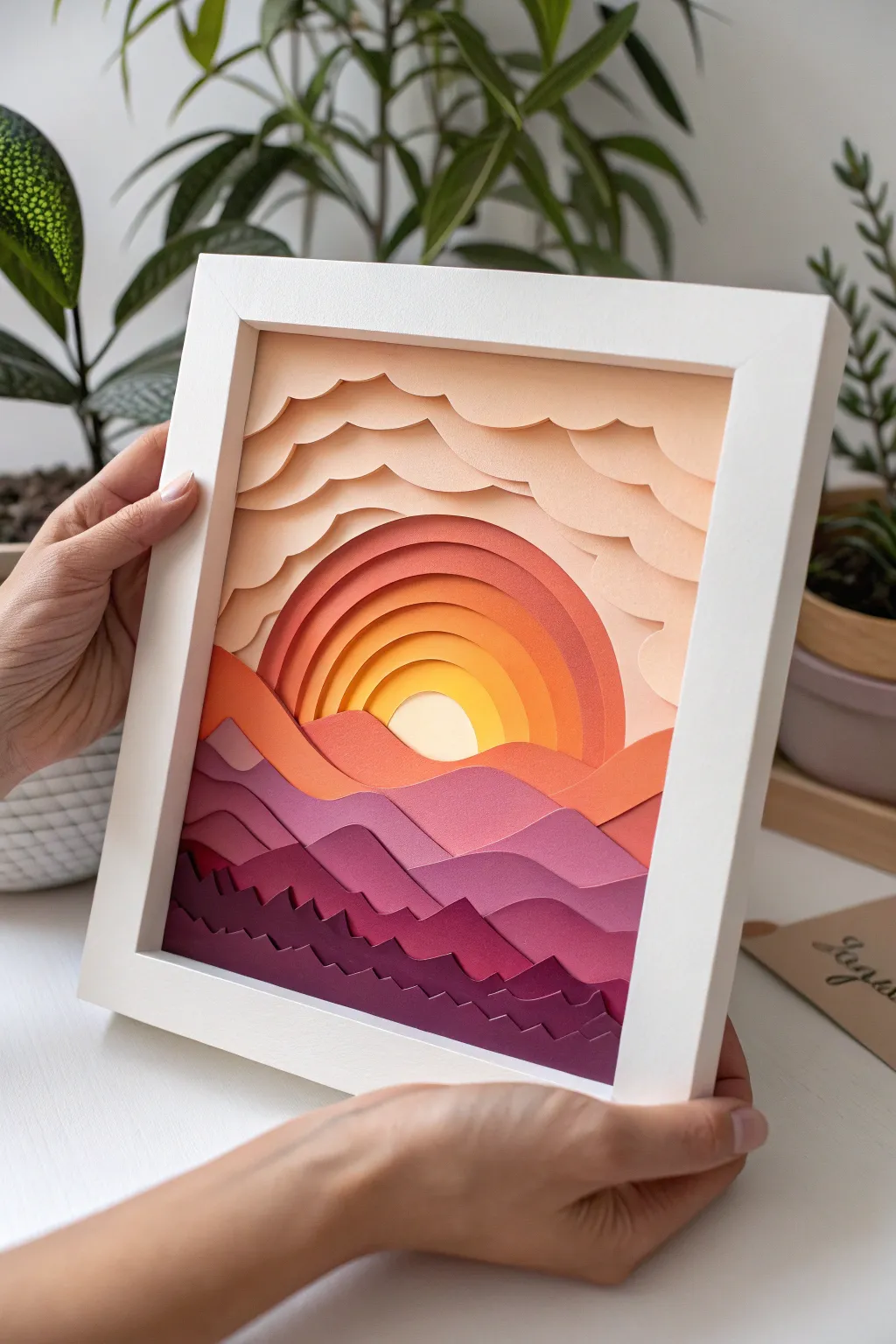 Discover the serene beauty of layered paper art—where simplicity meets elegance in a breathtaking sunset scene.