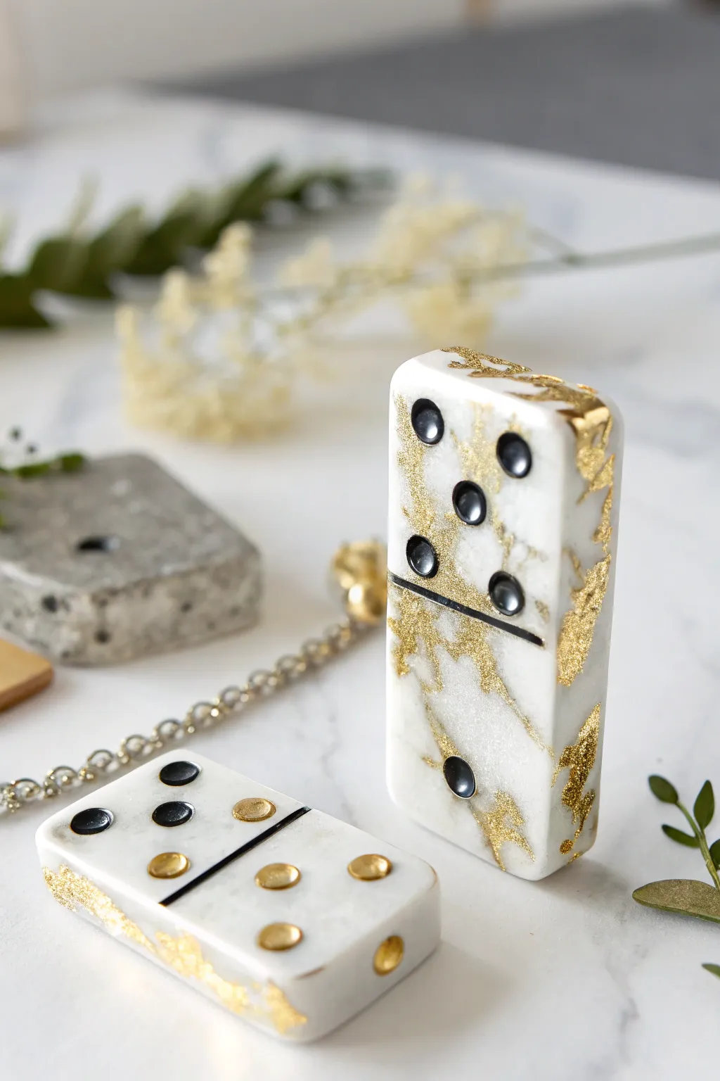 Add a touch of elegance to your game nights with metallic resin dominoes. #Craftsmanship #MinimalistBeauty