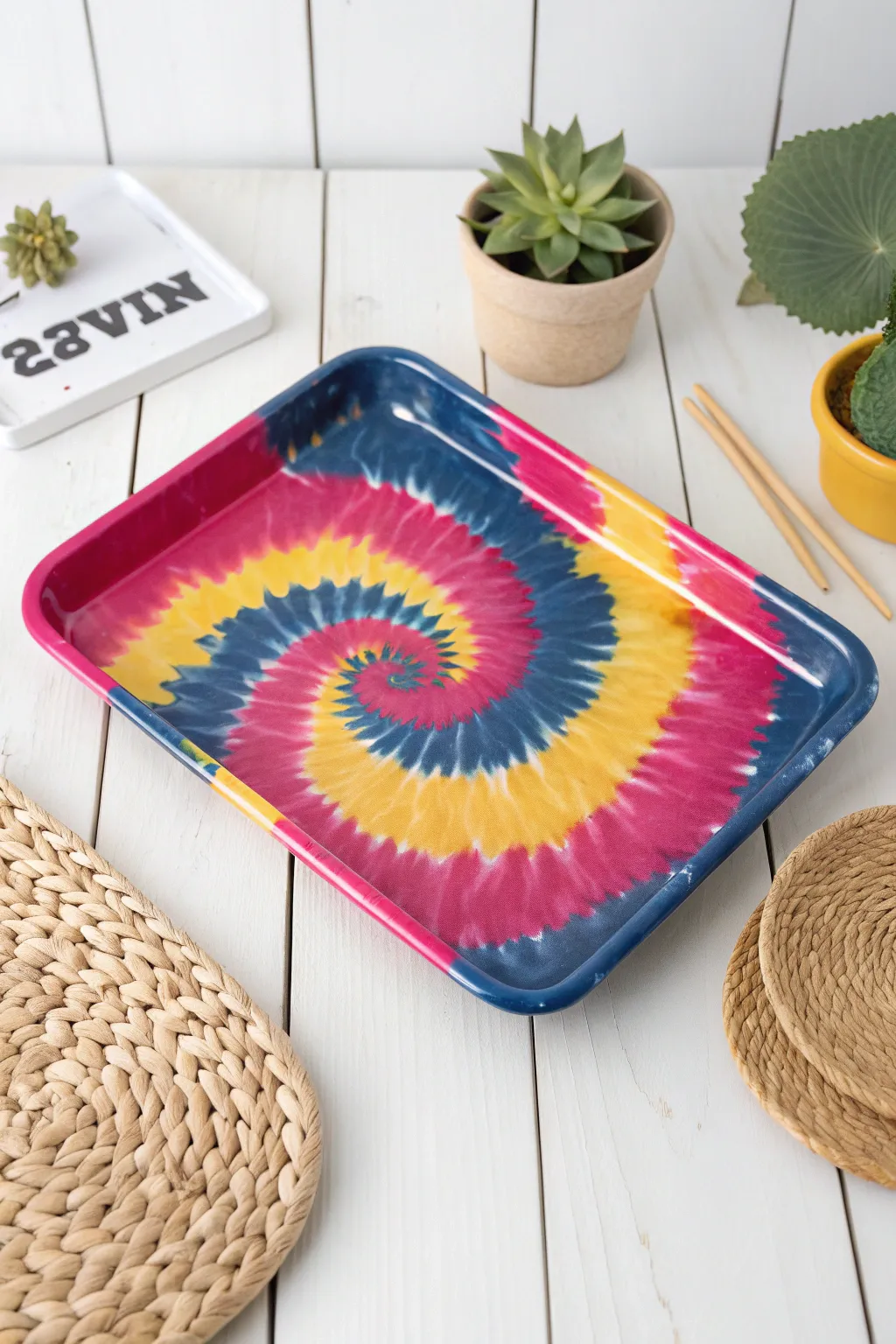 Add a touch of groovy elegance to your space with this vibrant tie-dye rolling tray. Perfect for those who love playful patterns and minimalist design!