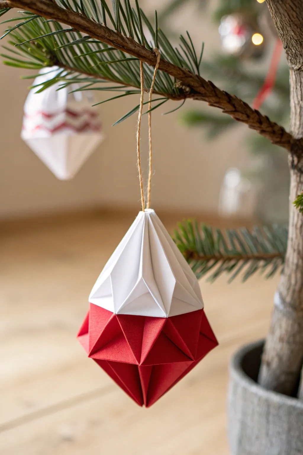 Elevate your holiday decor with handcrafted origami Santa ornaments that blend simplicity and elegance.