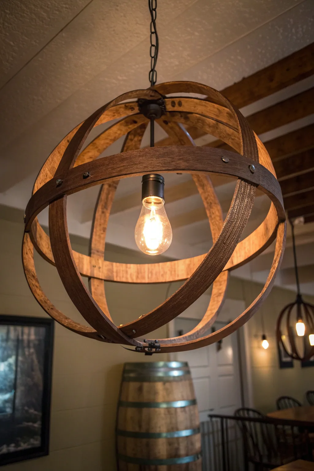 Illuminate your space with a touch of rustic elegance—crafted from wine barrel rings.