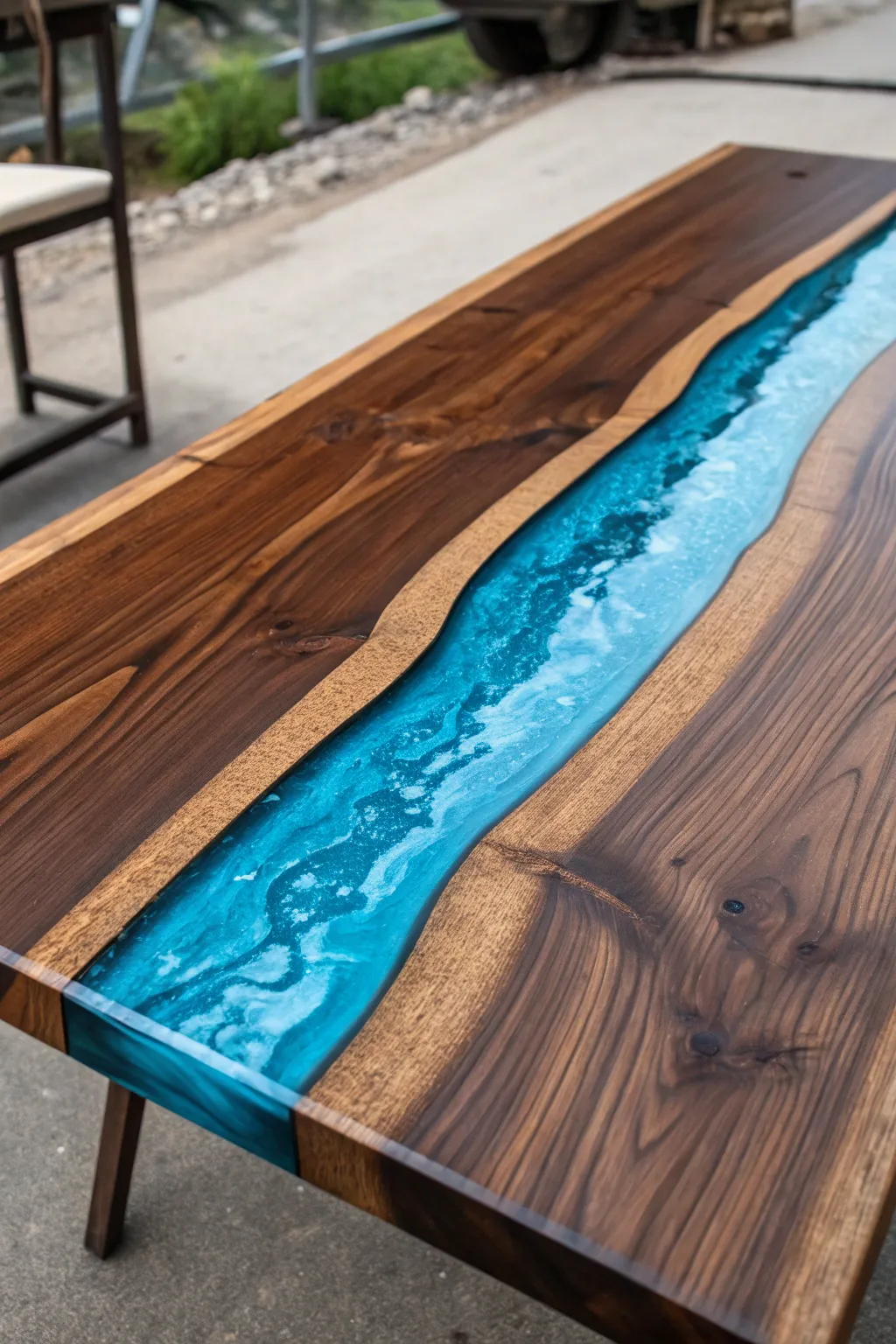 Dive into craftsmanship with this stunning epoxy resin river table.