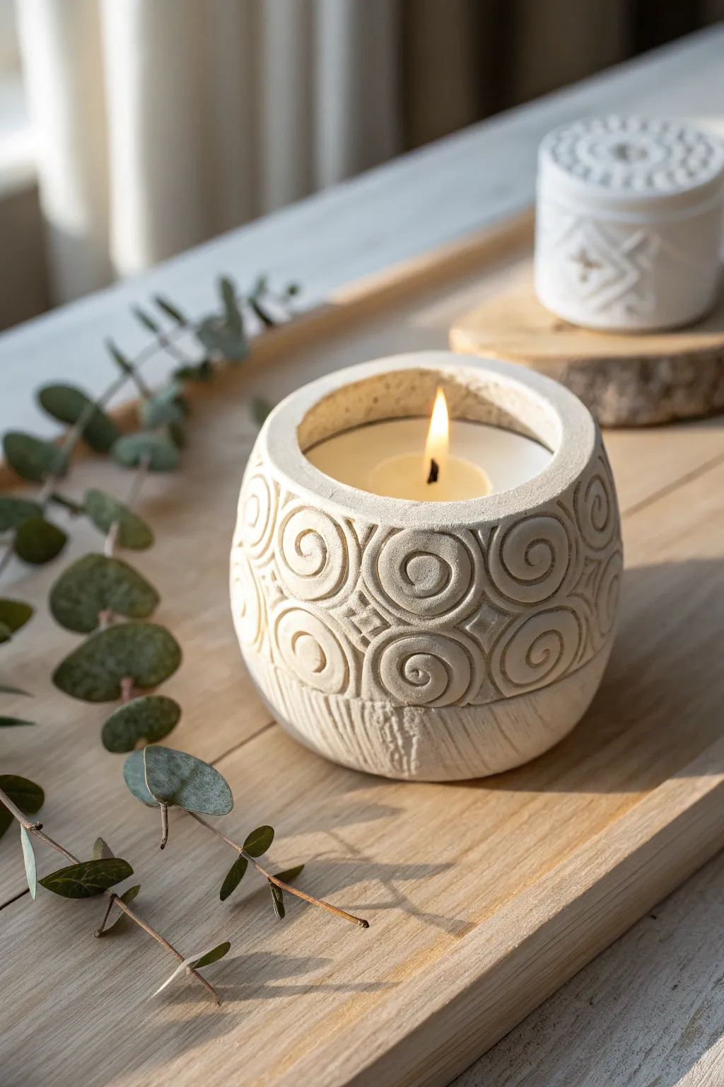 Illuminate your space with the timeless elegance of a handcrafted clay candle holder, perfect for adding warmth and charm this Mother's Day.