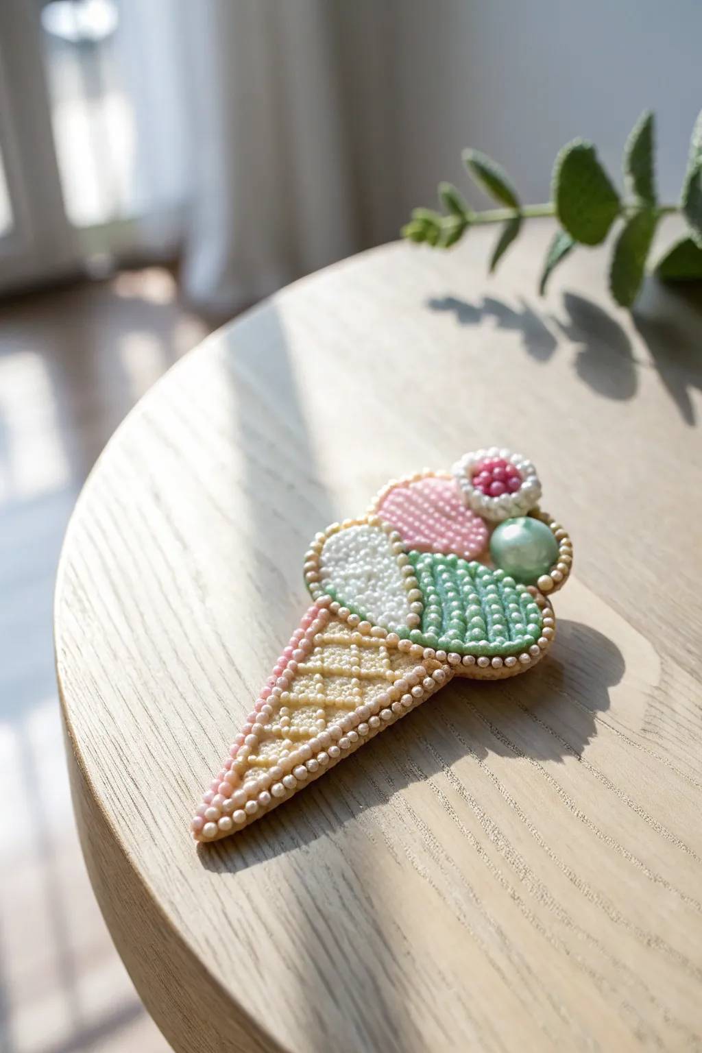 Sweeten your style with this charming beaded ice cream brooch, a perfect splash of summer fun.