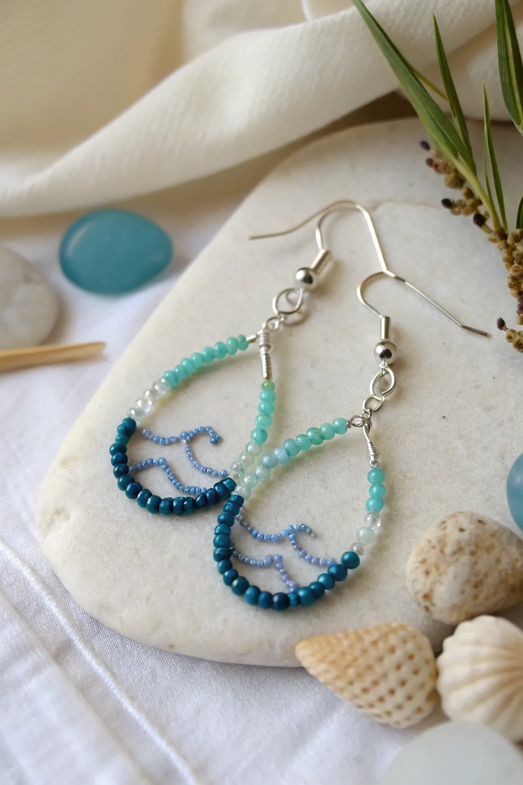 Embrace Oceanic Charm with these stunning handcrafted earrings, perfect for capturing the essence of summer.