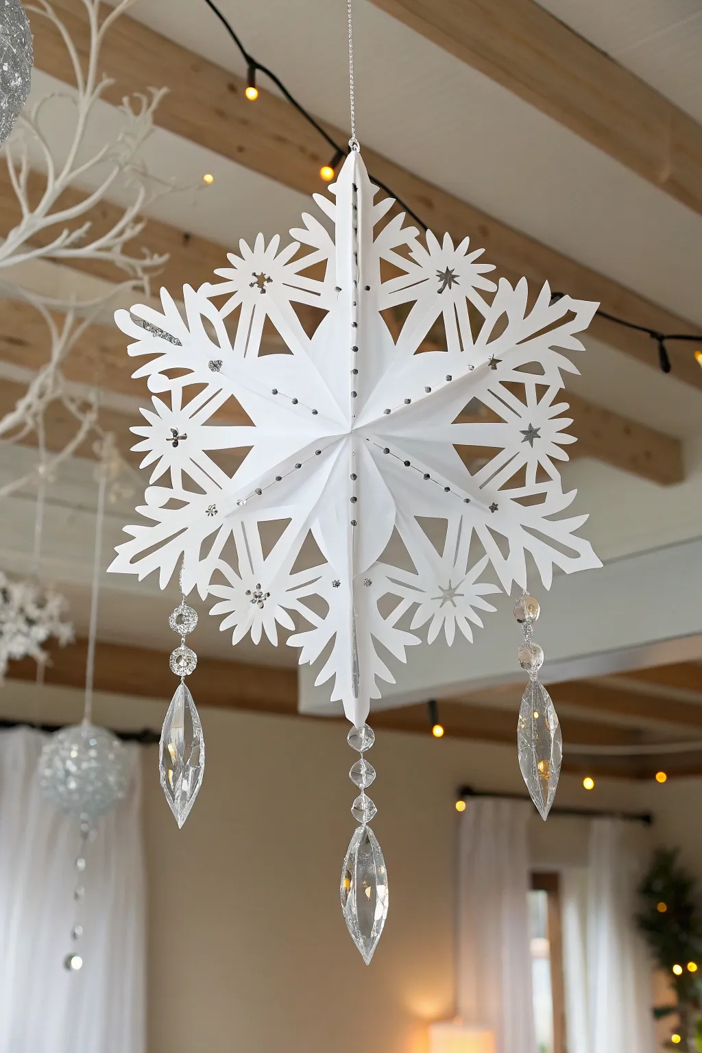 Transform your home into a winter wonderland with handcrafted snowflakes and shimmering icicles, bringing the magic of snowy evenings indoors.