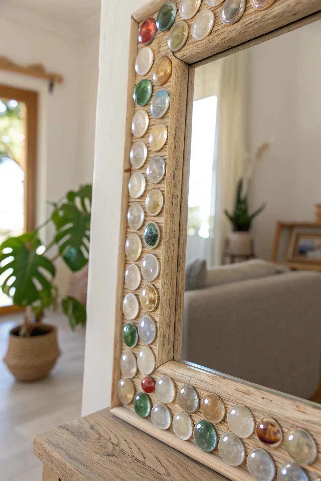 Transform your space with a touch of magic! This DIY Fantasy Mirror Frame adds elegance and charm with simple glass marbles.