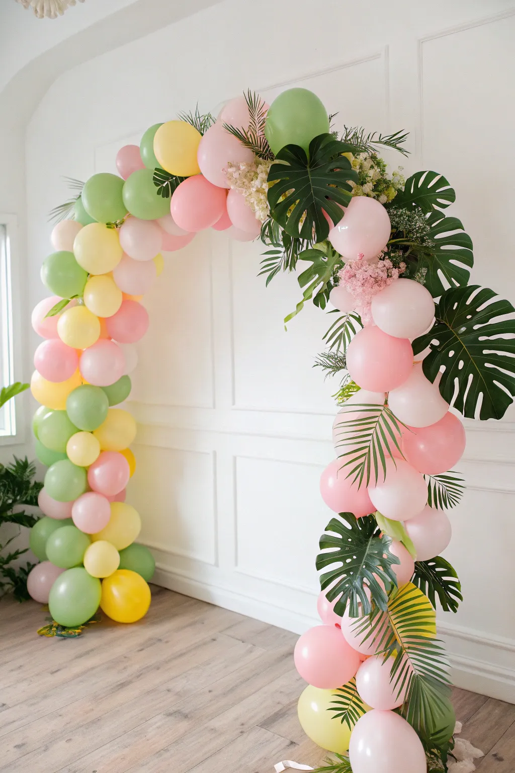 Capture the essence of a Hawaiian sunset with this stunning DIY balloon arch, blending minimalist charm with tropical flair.