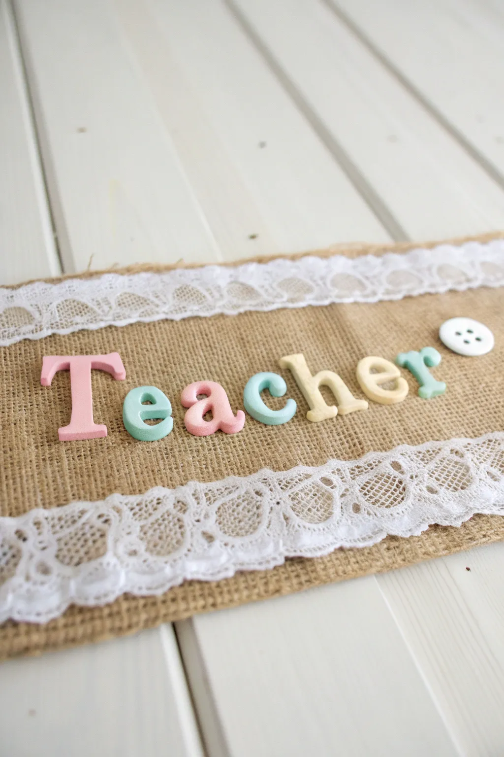 Embrace simplicity and elegance with this DIY burlap and lace teacher sign, perfect for a charming classroom touch.