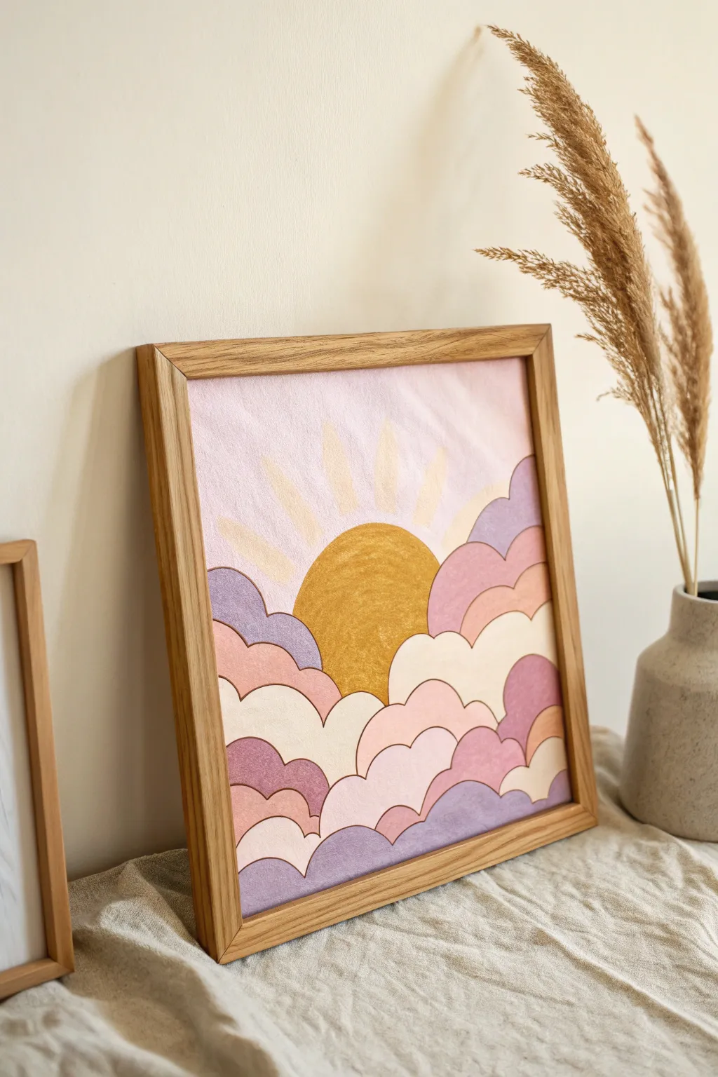 Bring the warmth of a sunrise into your space with this serene sun and cloud painting. Perfect for a touch of minimalist elegance.