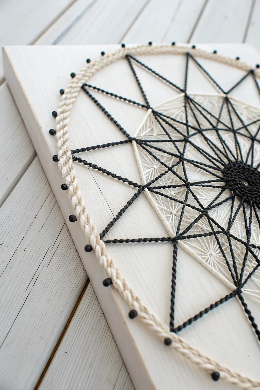 Elevate your space with sleek, modern string art that complements any decor style.
