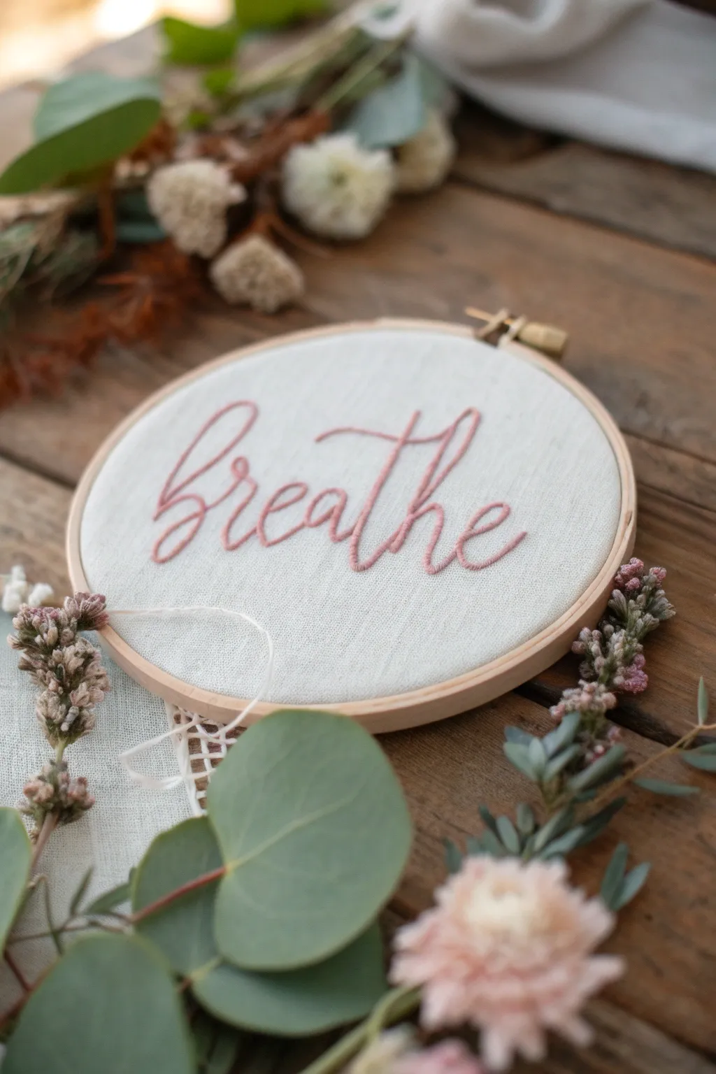 Add a personal touch to your space with simple, meaningful text embroidery that speaks to the heart.