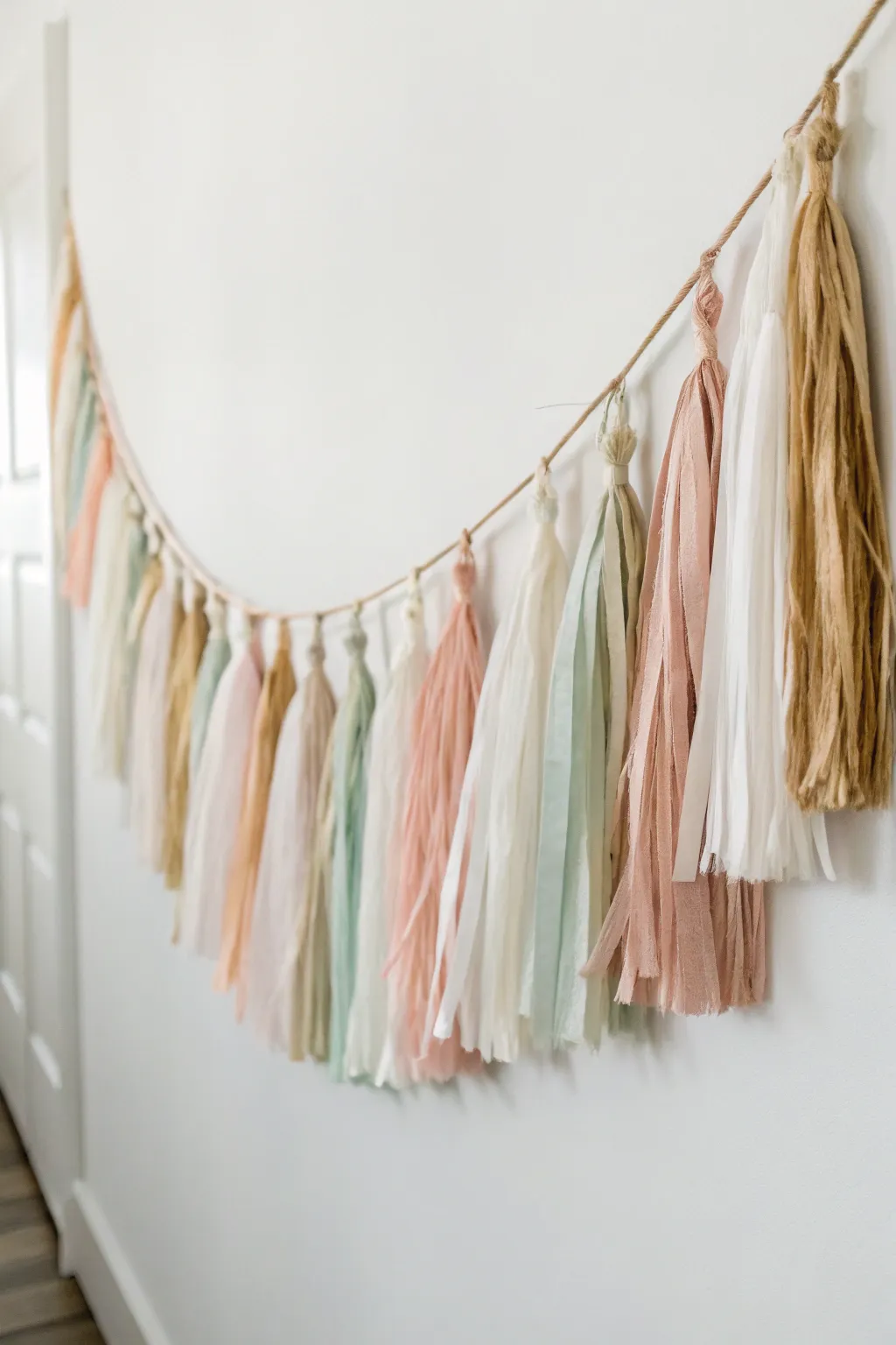 Elevate your bridal shower decor with a handcrafted garland that combines simplicity and elegance.