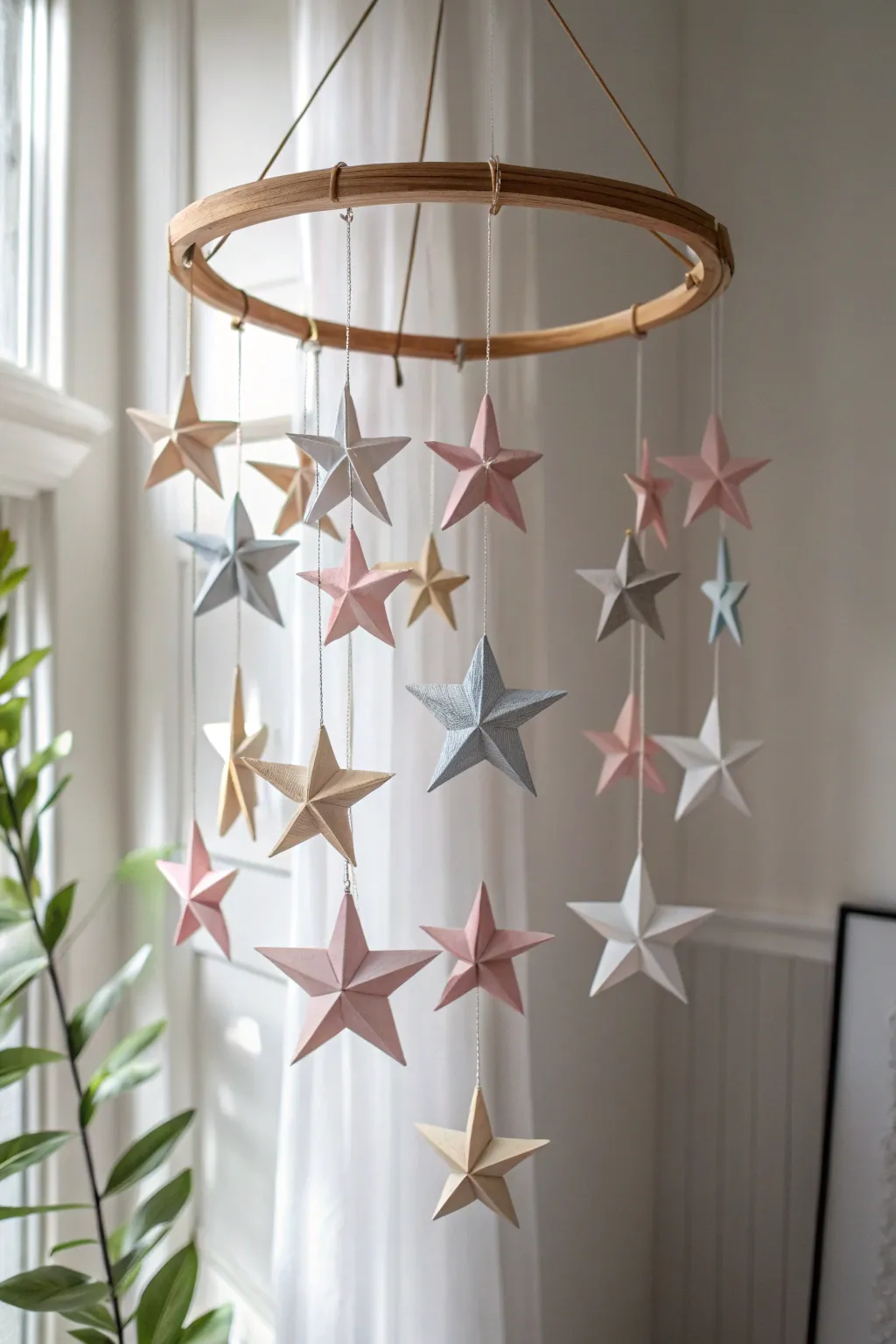 Elevate your space with a charming paper star mobile, blending minimalist elegance with a touch of Boho flair.