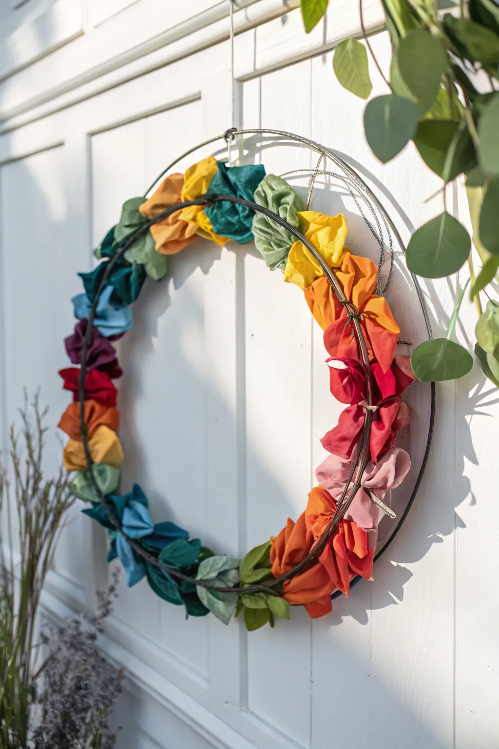 Add a pop of color with this whimsical fabric strip wreath, perfect for any minimalist space!