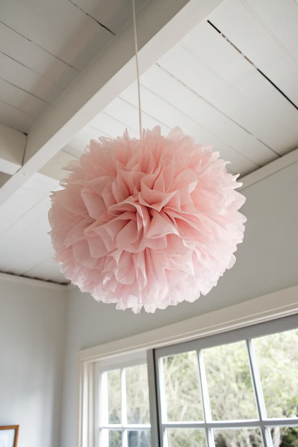Add a touch of whimsy to your space with a dreamy tissue paper pom-pom. 🌸✨ #CraftedBeauty #ScandiBoho