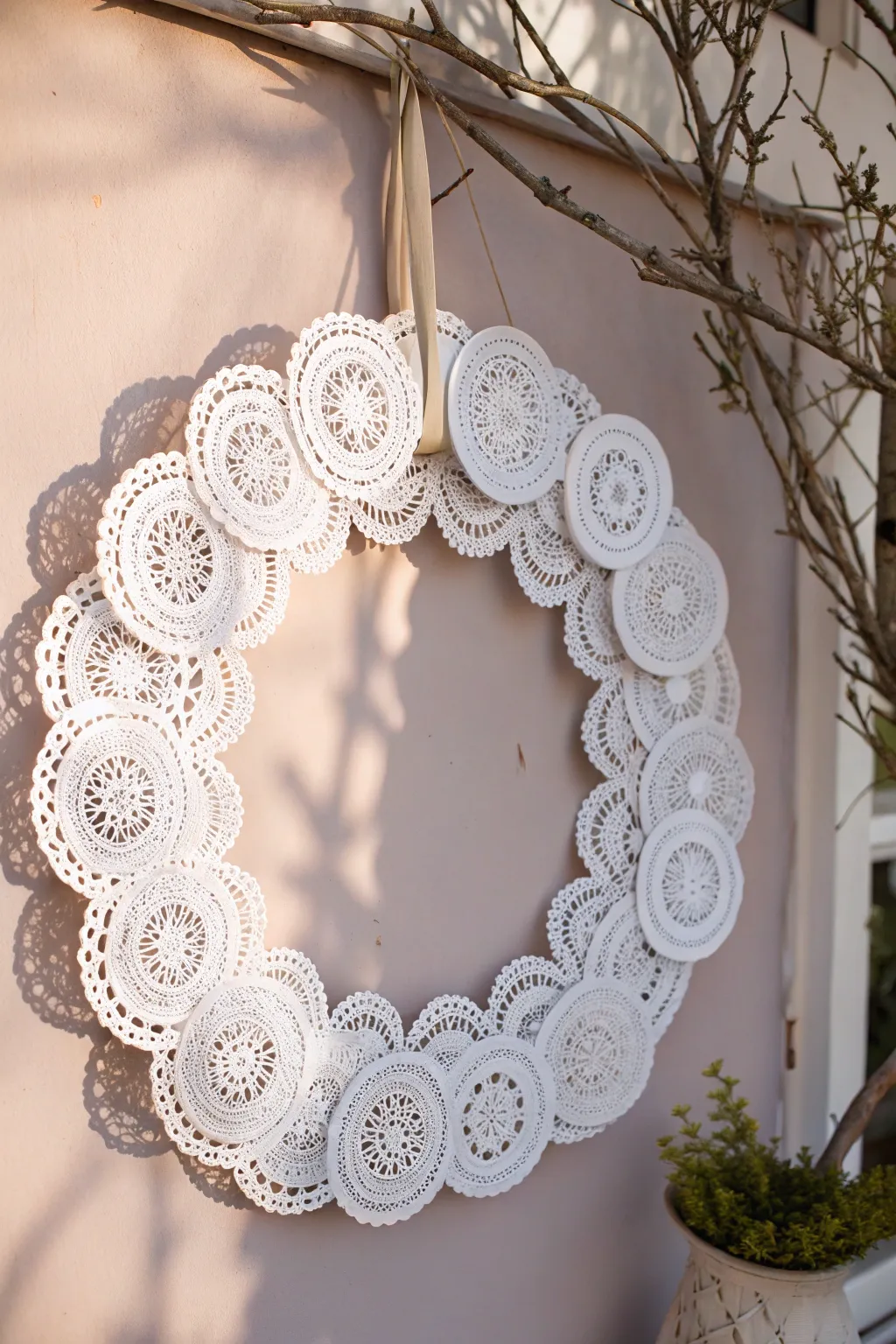 Embrace the charm of simplicity with a whimsical doily wreath that adds a touch of romance to any space.