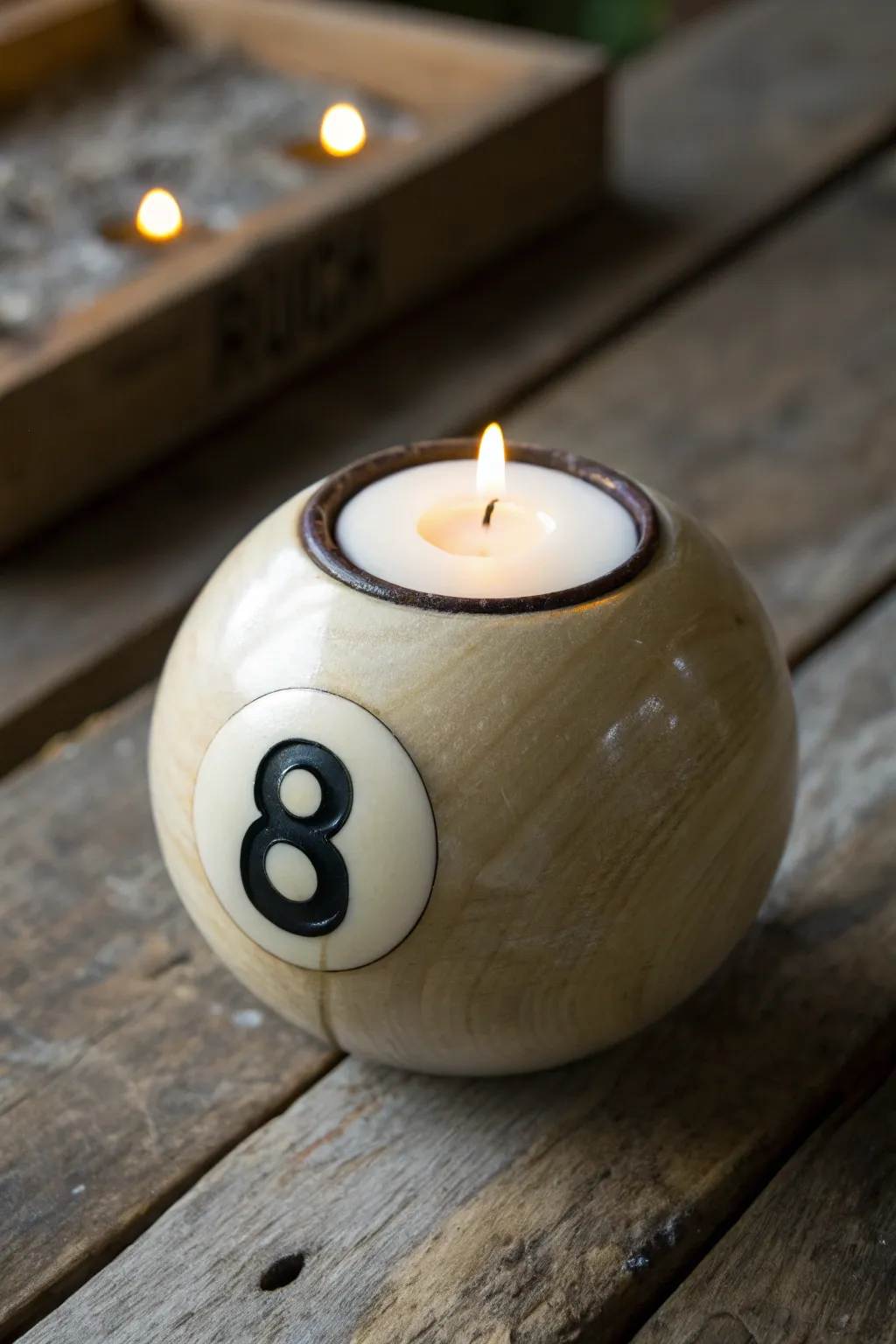 Craftsmanship meets creativity: Illuminate your space with this bespoke pool ball candle holder.