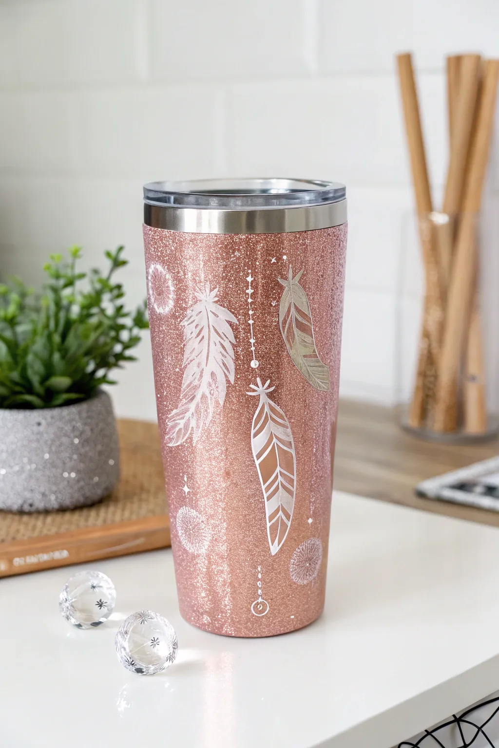 Elevate your tumbler game with a touch of rose gold elegance and boho flair.