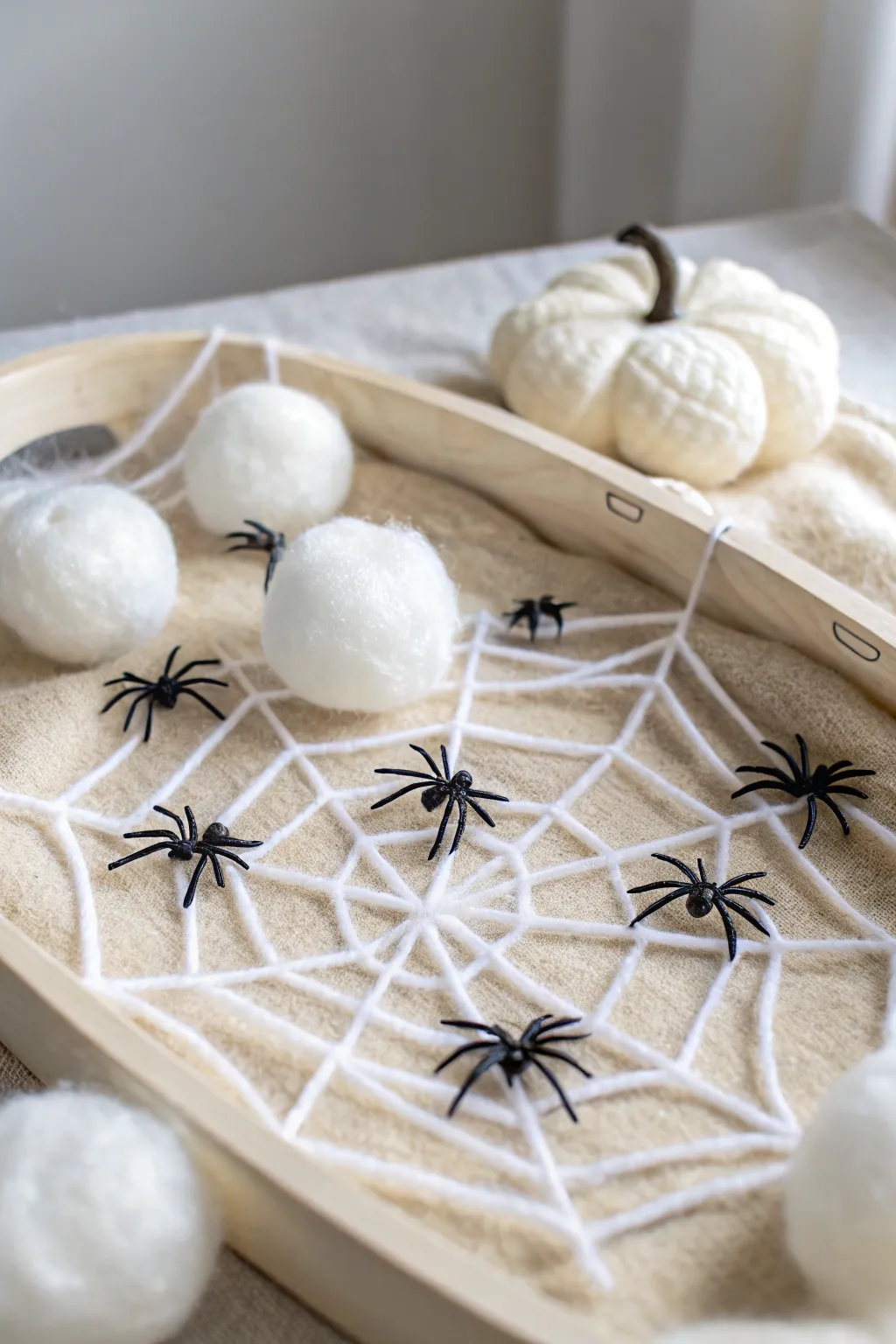 Embrace the spooky season with a beautifully crafted spider web sensory bin, perfect for a touch of Halloween magic!