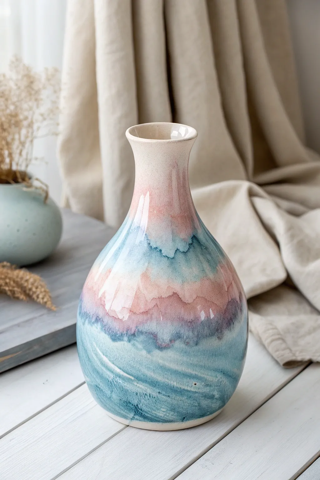 Embrace the dreamy fluidity of watercolor glazes for a touch of artistic elegance in your pottery.