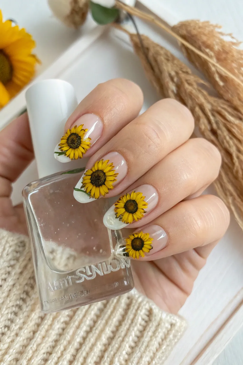 Make a bold statement with these stunning oversized sunflower nails, perfect for showcasing your adventurous spirit!