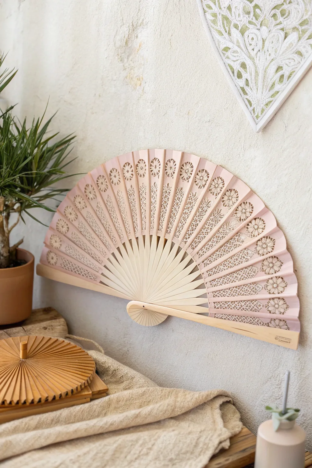 Elevate your decor with this chic, handcrafted paper fan—where minimalist elegance meets bohemian charm.
