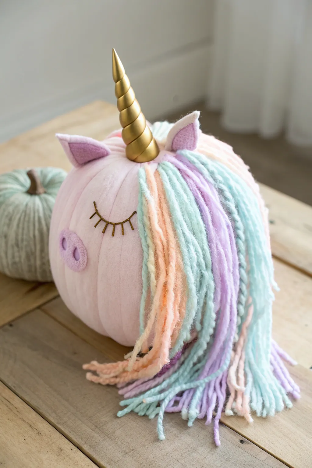 Transform your pumpkin into an enchanting unicorn with pastel hues and a touch of whimsy!