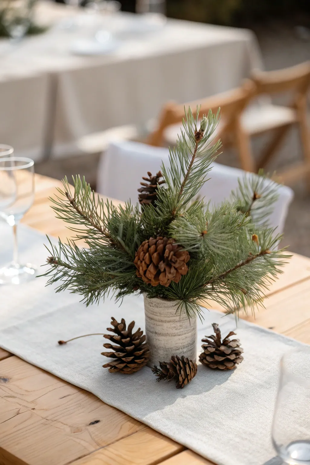 Embrace the enchanting simplicity of nature with this beautiful DIY winter wedding centerpiece.