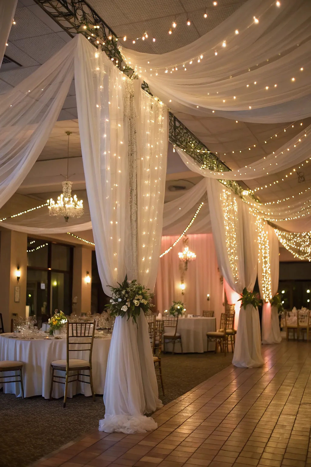 Draped fabrics and lights create a whimsical and dreamy atmosphere.